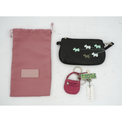 1258 - A Radley handbag, key fob and small bag.