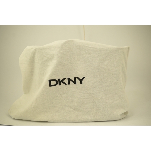 1262 - A DKNY black patient leather tote with scarf detail. with original dust bag.