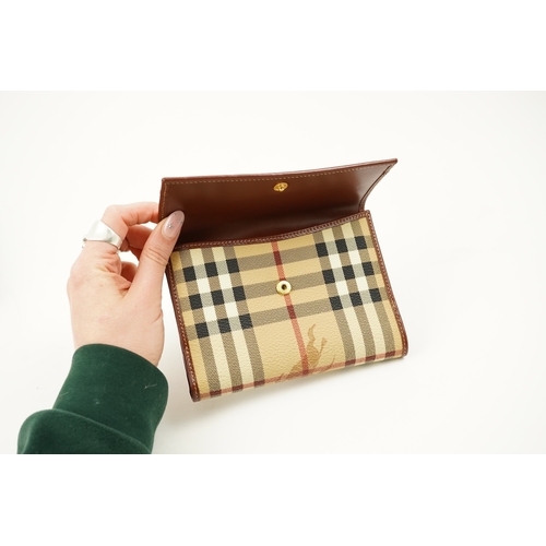 1264 - A Burberry brown tartan scarf, sunglasses with case and wallet with original box.