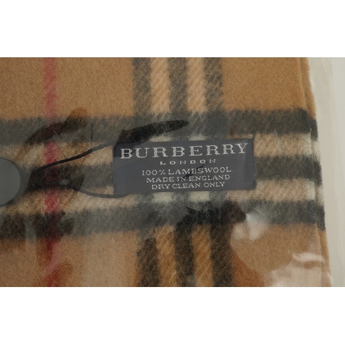 1264 - A Burberry brown tartan scarf, sunglasses with case and wallet with original box.