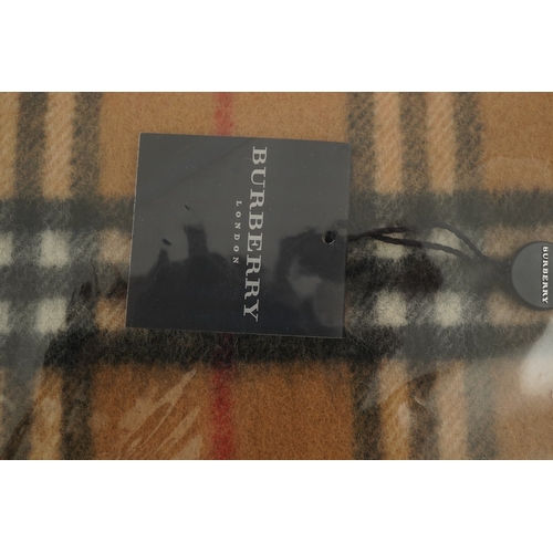 1264 - A Burberry brown tartan scarf, sunglasses with case and wallet with original box.