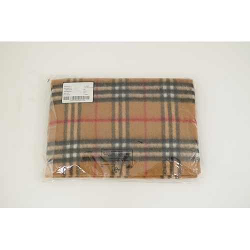 1264 - A Burberry brown tartan scarf, sunglasses with case and wallet with original box.