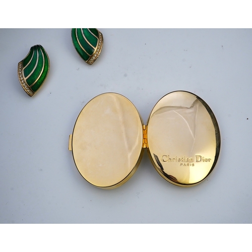 1280 - A pair of Christian Dior vintage earrings and compact mirror.