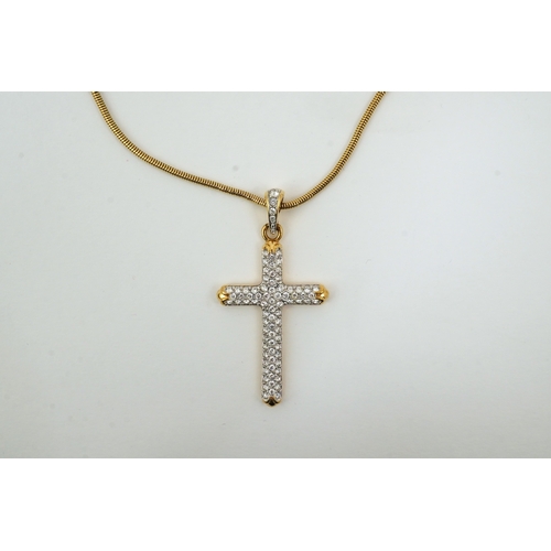 1287 - A Swarovski vintage cross necklace and ring.