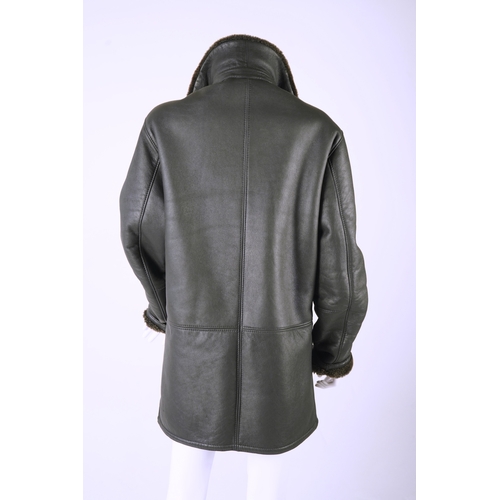 1290 - A Hugo Boss black leather fleece lined gentleman's coat Size M