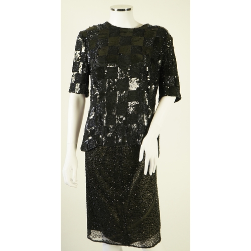 1296 - A lady's Jaeger black sequin skirt and black sequin top (not matching). Size UK 12-14