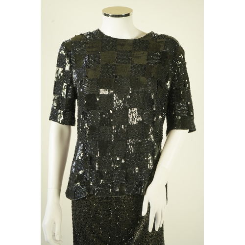 1296 - A lady's Jaeger black sequin skirt and black sequin top (not matching). Size UK 12-14