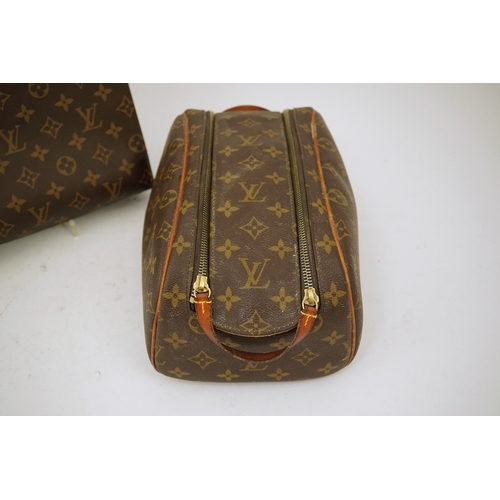 1300 - Two Louis Vuitton wash bags