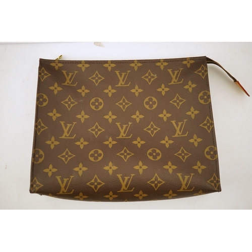 1300 - Two Louis Vuitton wash bags