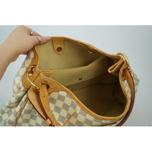 1303 - A Louis Vuitton handbag made from Damier Azur canvas with natural cowhide trim, with original dust b... 