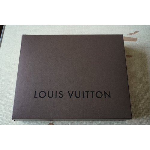 1303 - A Louis Vuitton handbag made from Damier Azur canvas with natural cowhide trim, with original dust b... 