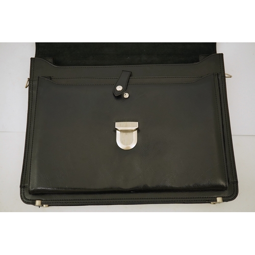 1308 - A Prada vintage black leather briefcase