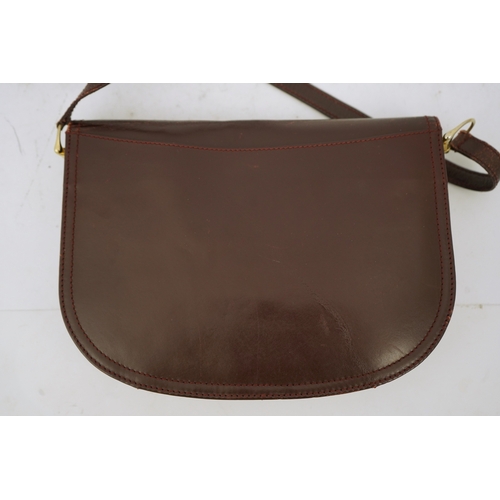 1312 - A Cartier leather shoulder bag