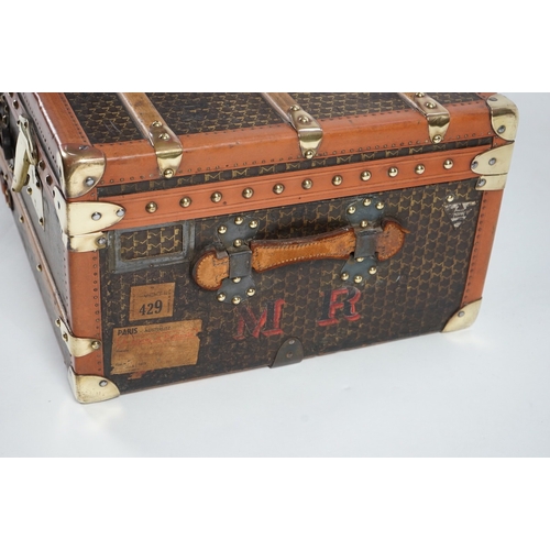 1320 - A vintage Moynat cabin trunk, with brass mounts, wooden slats and tan leather bound M motif canvas, ... 