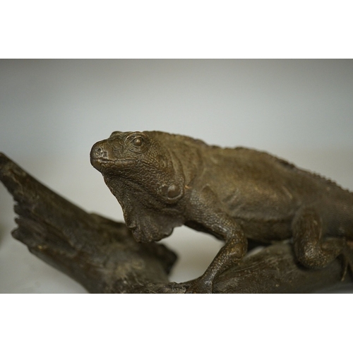 1354 - A bronze of an Iguana on a branch, 33cm long. Condition - good.