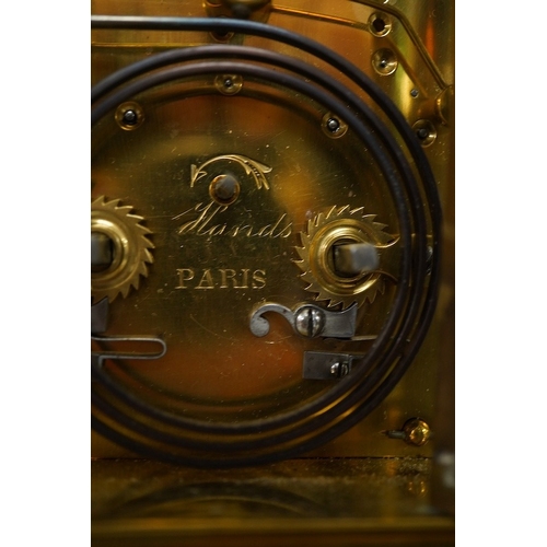 1355 - A French brass repeating carriage clock, engraved Paris to the backplate, 15cm high. Condition - goo... 