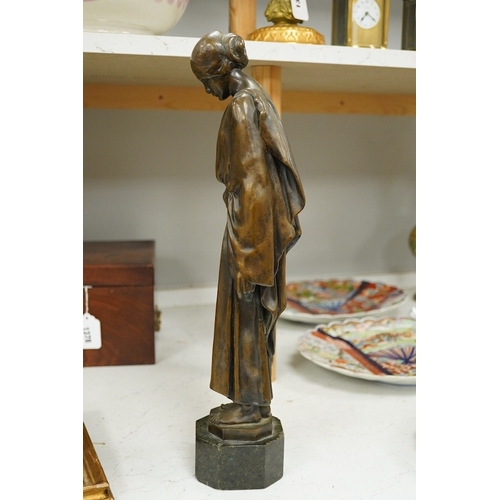 1379 - An early 20th century bronze figure of a classical maiden holding a laurel wreath, 46cm high. Condit... 