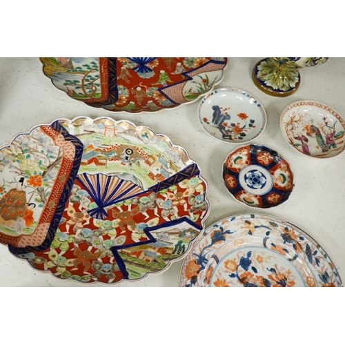 1380 - Eight Chinese 18th and 19th century plates and dishes, together with a painted botanical plate and a... 