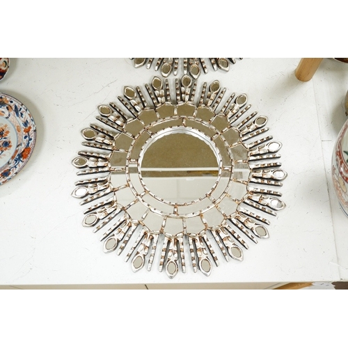 1381 - A pair of silver painted sunburst style contemporary wall mirrors, 44cm diameter. Condition - good... 