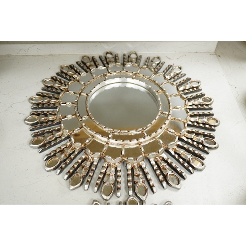 1381 - A pair of silver painted sunburst style contemporary wall mirrors, 44cm diameter. Condition - good... 