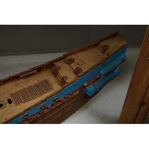 1391 - A scratch built model of a ship and a toy racing car and driver, ship 89cm wide. Condition - poor... 