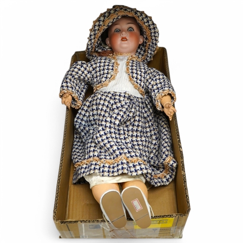 1393 - A stamped, Trebor Germany 22, bisque headed, open mouthed doll. 60cm long. Condition - fair to good... 