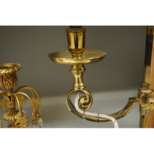 1395 - A bronze, ormolu and lustre candlestick, a bronze and ormolu cherub two branch sconce, a French bras... 