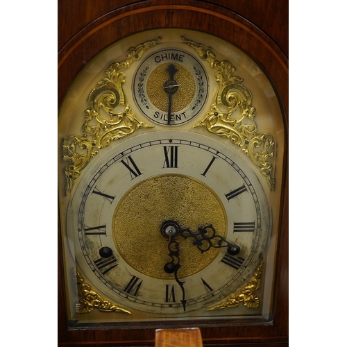 1396 - An Edwardian three train mahogany bracket clock and bracket, chiming on four coiled gongs, clock 42.... 