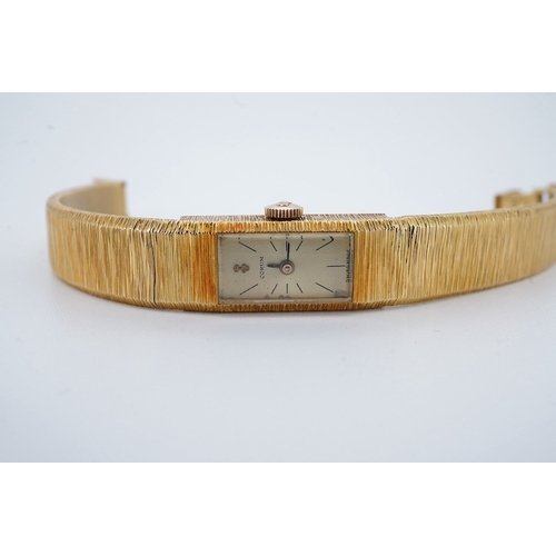 1945 - A lady's 1960's 18ct gold manual wind bracelet watch, overall length 16.5cm, gross weight 37.1 grams... 