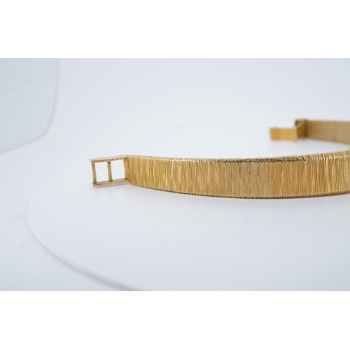 1945 - A lady's 1960's 18ct gold manual wind bracelet watch, overall length 16.5cm, gross weight 37.1 grams... 