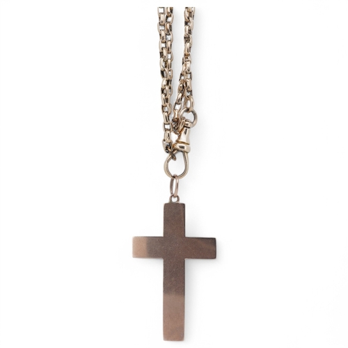 1946 - A George V 9ct cross pendant, 41mm, together with an earlier 9ct? double row guard chain, 88cm, gros... 