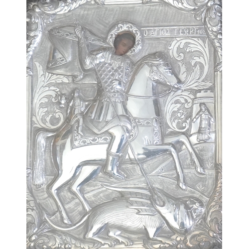 51 - 19th century Greek School St George and the dragonicon with silver oklad28 x 24cm... 