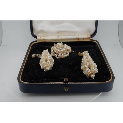 900 - A pair of 19th century seed pearl cluster drop earrings, with 9ct clips, 69mm, together with a simil... 