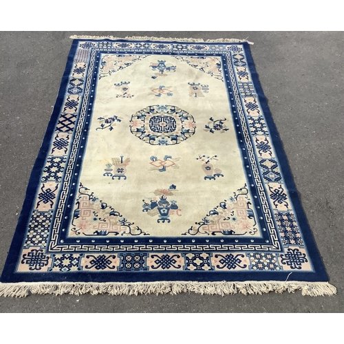 1078 - A Chinese ivory ground rug, 244 x 156cm. Condition - fair