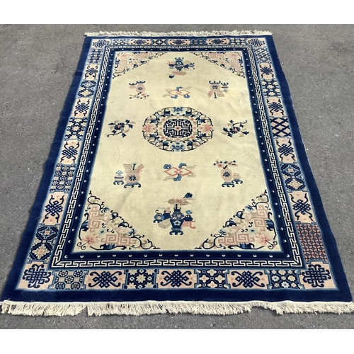 1078 - A Chinese ivory ground rug, 244 x 156cm. Condition - fair