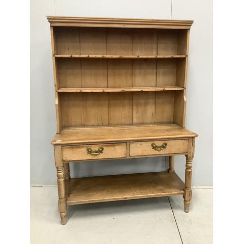 1090 - A Victorian pine potboard dresser with boarded rack, width 129cm, depth 53cm, height 181cm. Conditio... 