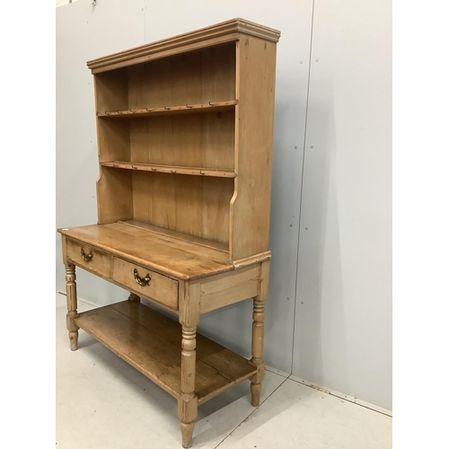 1090 - A Victorian pine potboard dresser with boarded rack, width 129cm, depth 53cm, height 181cm. Conditio... 