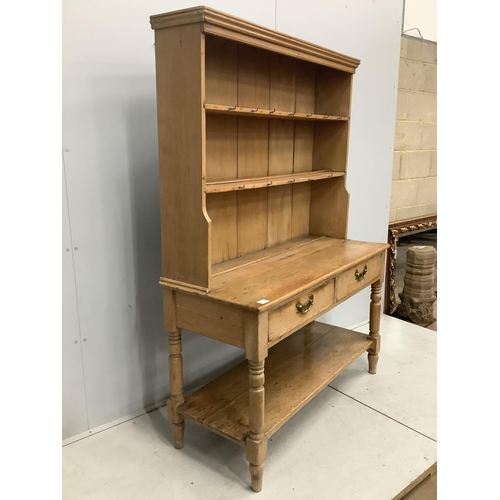 1090 - A Victorian pine potboard dresser with boarded rack, width 129cm, depth 53cm, height 181cm. Conditio... 