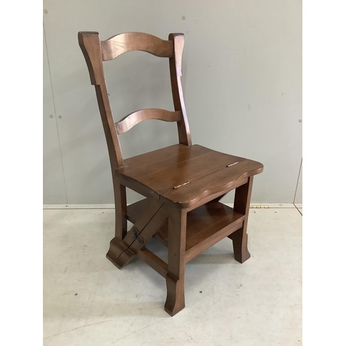 1091 - A reproduction Victorian style hardwood metamorphic library chair, width 42cm, height 84cm. Conditio... 