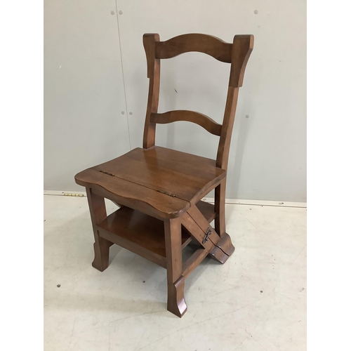 1091 - A reproduction Victorian style hardwood metamorphic library chair, width 42cm, height 84cm. Conditio... 