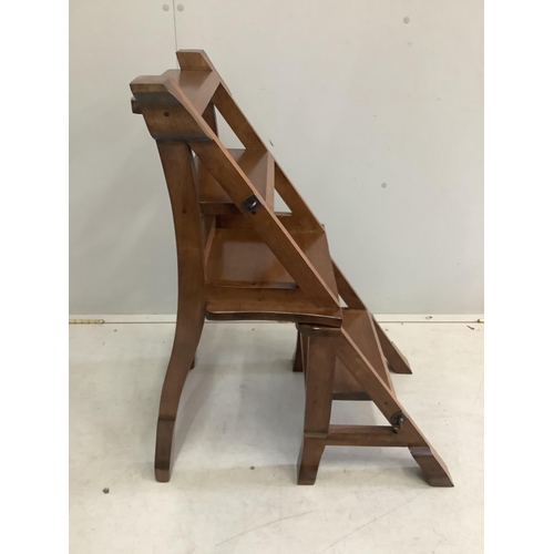 1091 - A reproduction Victorian style hardwood metamorphic library chair, width 42cm, height 84cm. Conditio... 