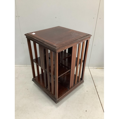 1106 - An Edwardian satinwood banded mahogany revolving bookcase, width 55cm, depth 55cm, height 82cm. Cond... 