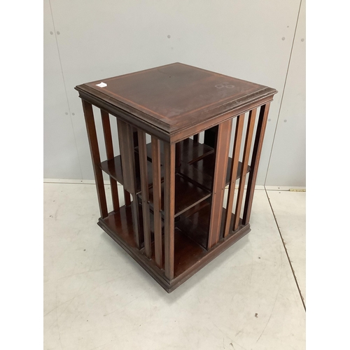 1106 - An Edwardian satinwood banded mahogany revolving bookcase, width 55cm, depth 55cm, height 82cm. Cond... 