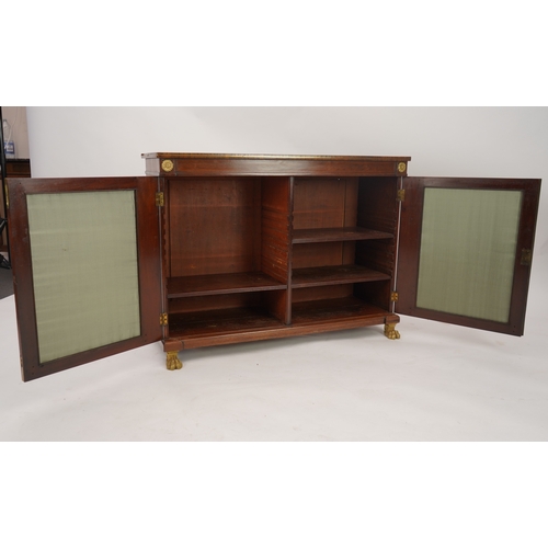 1141 - A Regency ormolu mounted rosewood and mahogany side cabinet, with brass front top and two silk pleat... 