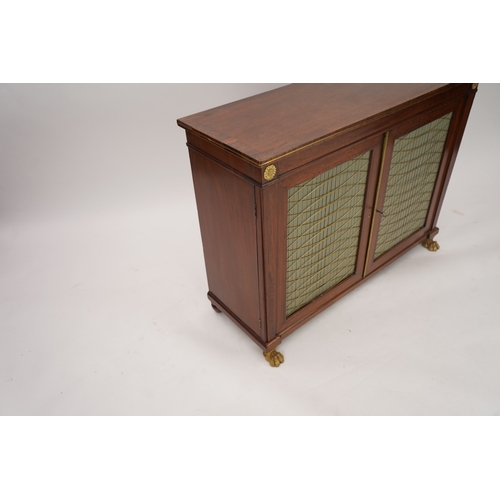 1141 - A Regency ormolu mounted rosewood and mahogany side cabinet, with brass front top and two silk pleat... 