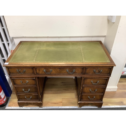 1154 - A reproduction mahogany pedestal desk, width 121cm, depth 60cm, height 79cm. Condition - fair