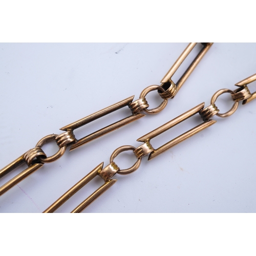 62 - A continental 18k gold open faced keyless lever pocket watch, with a 9ct albert, the watch with Roma... 