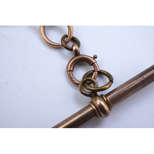 62 - A continental 18k gold open faced keyless lever pocket watch, with a 9ct albert, the watch with Roma... 