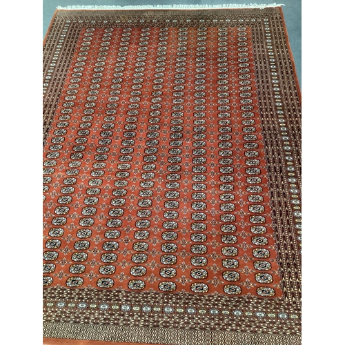 143 - A Bokhara red ground carpet, 410 x 310cm. Condition - good