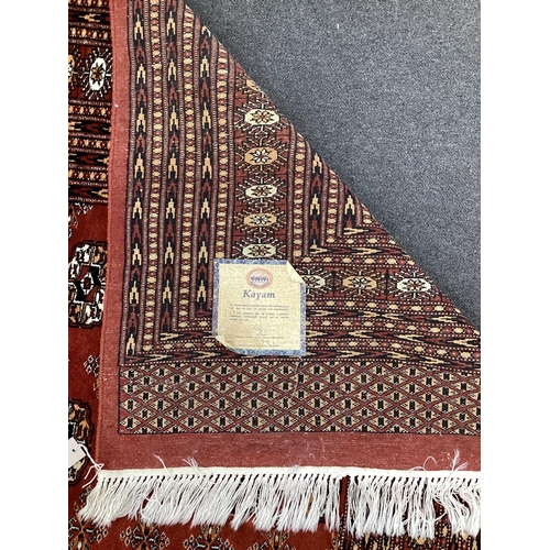 143 - A Bokhara red ground carpet, 410 x 310cm. Condition - good